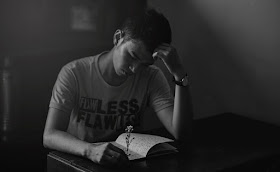 Young man feeling sorry for himself,  black and white