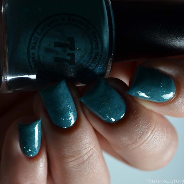 teal nail polish with green flakies