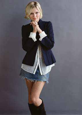 Kirsten Dunst looks cute in a skirt