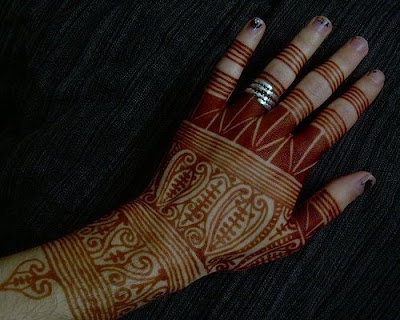 Design taken from traditional Dayak hand tattoos from Borneo.