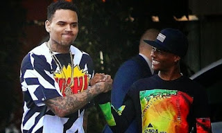 image result for chris brown and wizkid