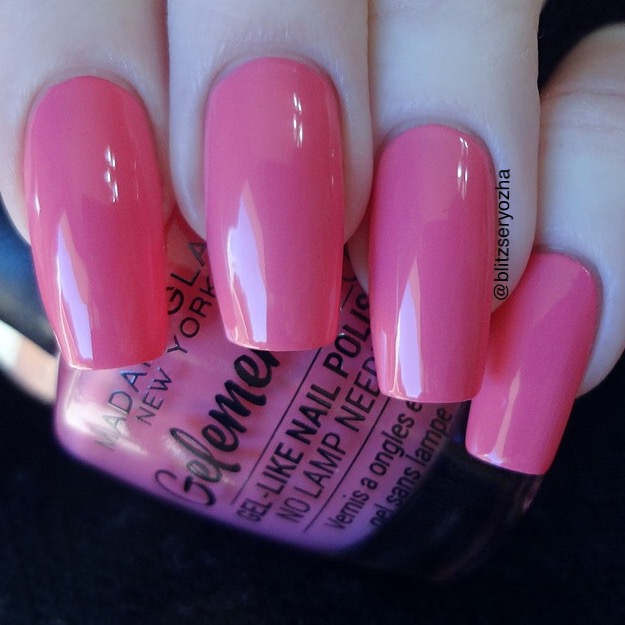 A swatch photo showing two coats of Madam Glam "Haters Gonna Hate," a hot pink creme polish