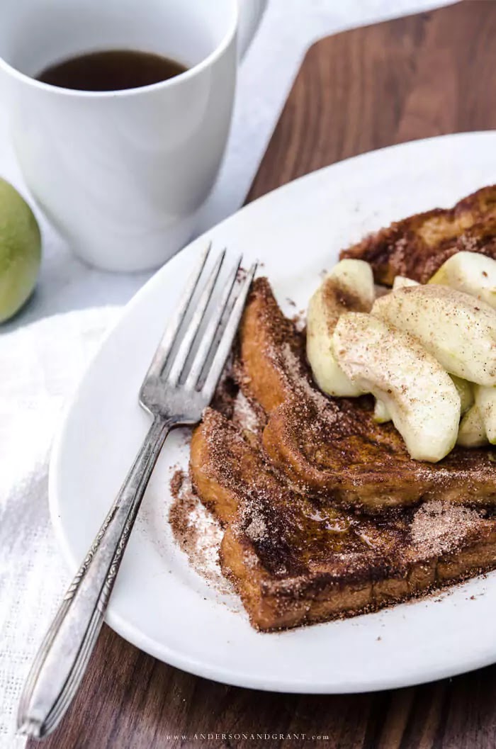 Cinnamon Apple French Toast on white plate with fork