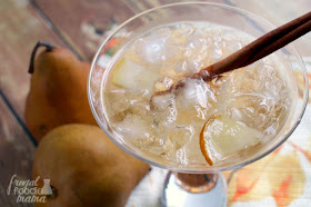 Sweet fresh pears and spiced rum come together in this perfect for fall Spiced Pear Planter's Punch.