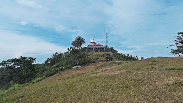 Capul Lighthouse viewed from the ridge of the peninsula