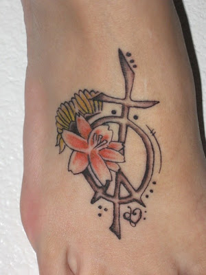 Beautiful peace sign-cross tattoo and flowers. Posted by bajol at 1:54 AM