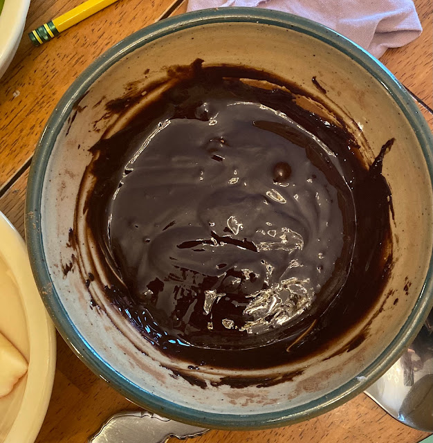 chocolate sauce in glass bowl