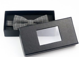 necktie in black window box