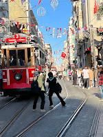 Postcard - Istiklal street trolly with crazy family