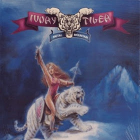 Metal album woman riding tiger with sword