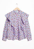 http://www.stories.com/be/Ready-to-wear/Blouses_Shirts/Frilled_Blouse/114066402-0559456001.2