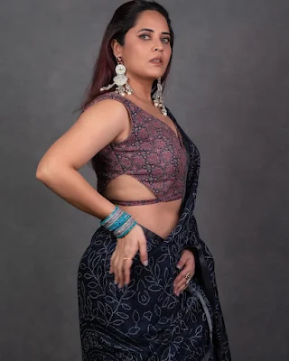 Anasuya Bharadwaj stylish looks in saree photos gallery