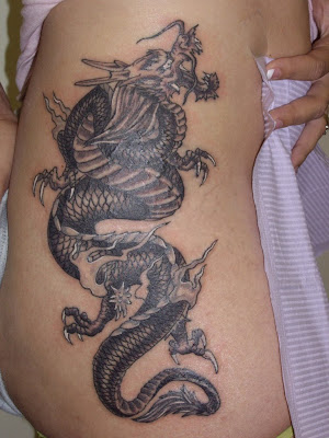 ribs tattoo female. rib tattoo dragon sexy women,