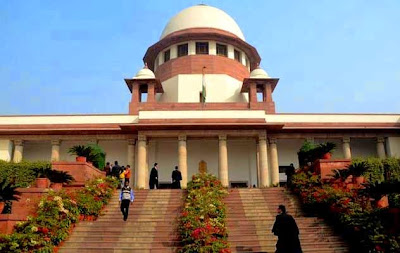 Supreme Court India, Chief Justice of India, Supreme Court India, Supreme Court of the United States, government ads, government-funded advertisements, photos of politicians on government ads