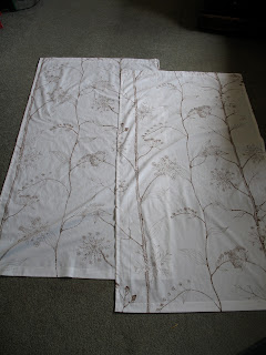 One full-sized sheet made two sidelight curtains.