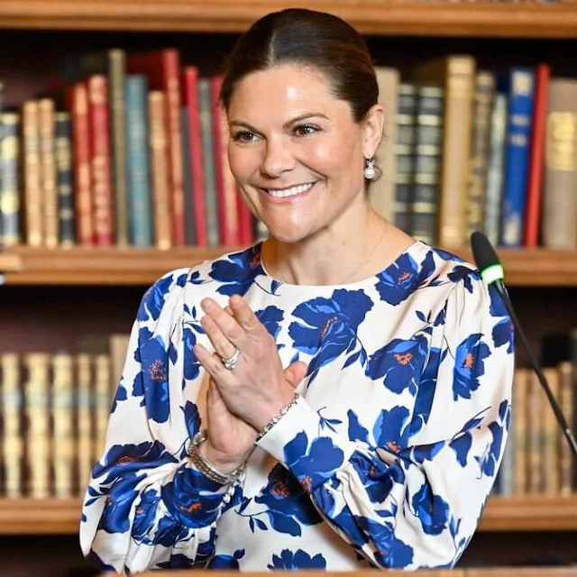 Crown Princess Victoria wore a poppy Alize midi dress by Malina. Victoria presented the gold medals of Federation of Swedish Farmers