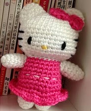 http://www.ravelry.com/patterns/library/crochet-kitty-hello-kitty-in-pink-dress-doll-toy