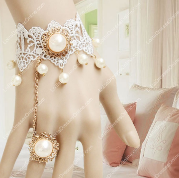 http://www.lolitadressesonline.com/white-lace-vintage-and-pearls-butterfly-lolita-bracelet-p-732.html