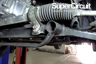 Front undercarriage of the Perodua Aruz with the SUPERCIRCUIT Front Under Brace installed.