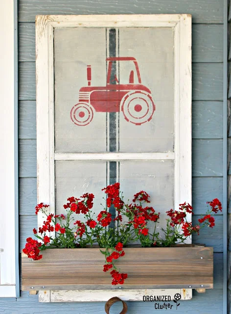 Photo of a stenciled window screen window box