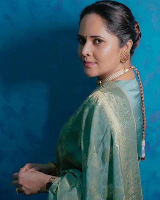 Anasuya Bharadwaj graceful looks in saree photoshoot