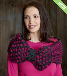 http://www.yarnspirations.com/pattern/crochet/ribbon-and-bow-cowl