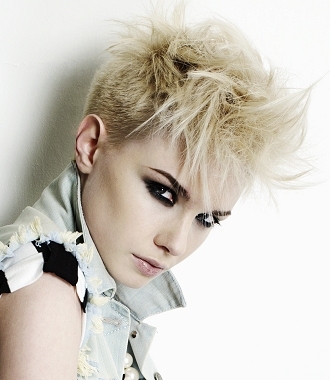 Punk fashion is the clothing hairstyles cosmetics jewelry 