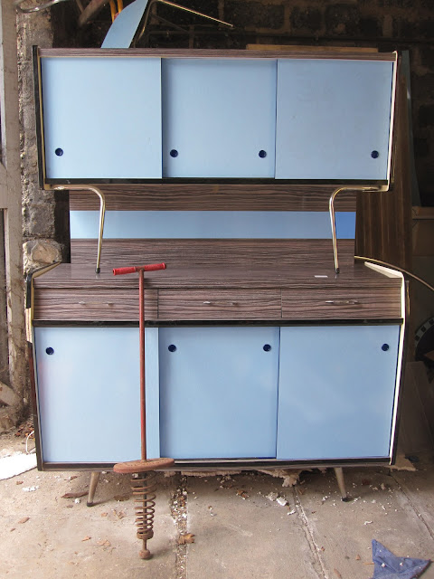 a pogo stick and  blue / brown formica kitchen cabinet, we were hesitant but 30€ , it's for nothing  1950 50s 1960 60s 1970 70s 