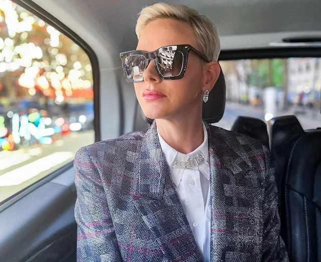 Princess Charlene is wearing Louis Vuitton outfit, blazer, blouse and trousers, from the Fall Winter 2022 collection