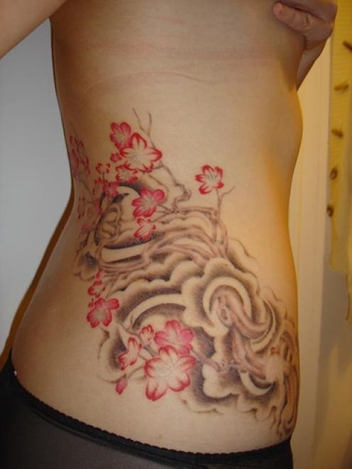 Hip tattoos are a great place for women to get a tattoo design 