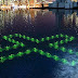 Floating LED sculpture educates public about water quality