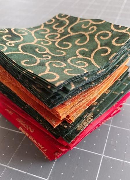 Metallic batiks quilted table topper