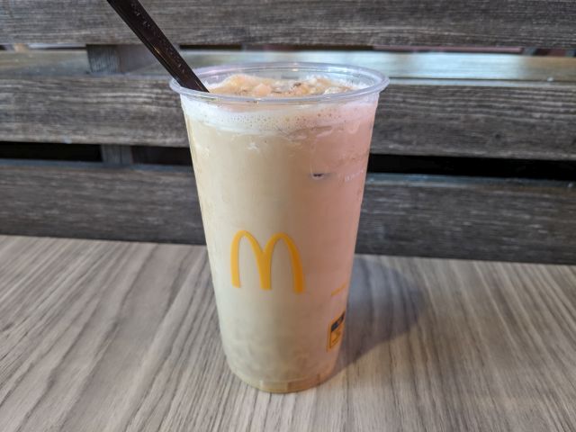 A fully mixed Korean Iced Coffee from McDonald's.