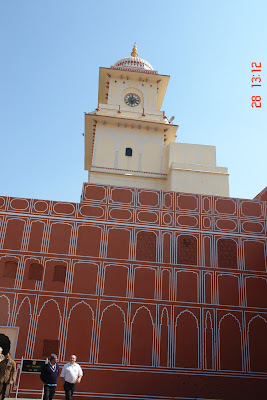 Photo of Building rising above the red section in Jaipur City Palace in India
