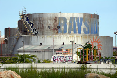 Heating oil storage tanks with Bayside logo and some graffiti