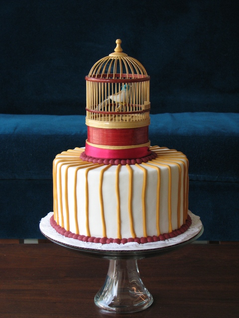 This bird themed cake has a working music box on top from Style Me Pretty