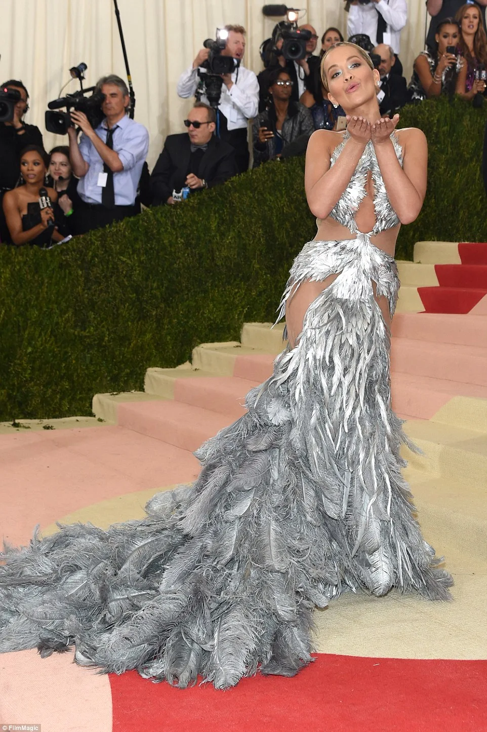 Rita Ora wears revealing feathered gown to the Met Gala 2016