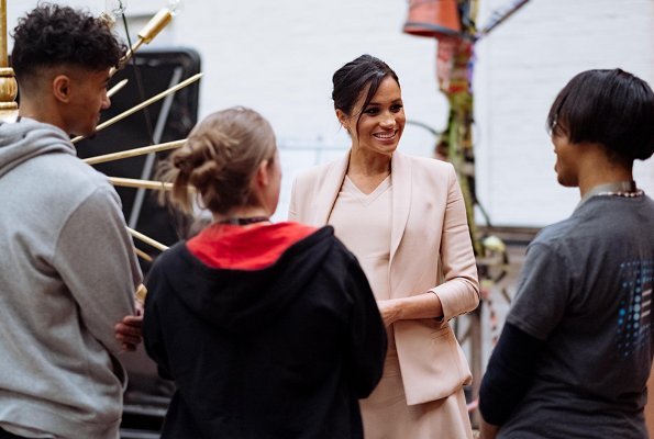 Meghan Markle wore Brandon Maxwell shawl collar blazer and V-Neck midi dress