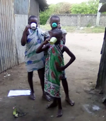 Children drinking black tea to cure coronavirus in Kenya