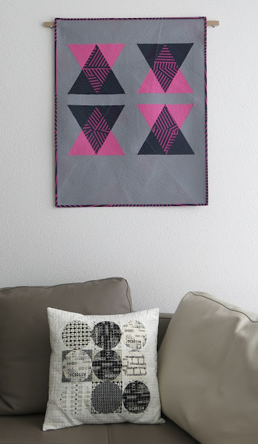 Luna Lovequilts - A modern triangle quilt with transparency effect