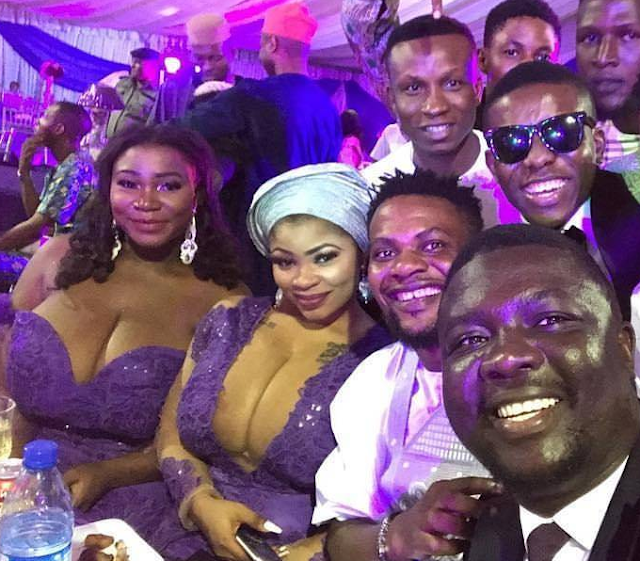 Seyilaw shares a photo with the busty ladies at Oritsefemi