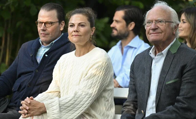 Crown Princess Victoria wore charley silk pants from By Malina. Toteme sweater. Princess Sofia wore a green blouse by Miss June