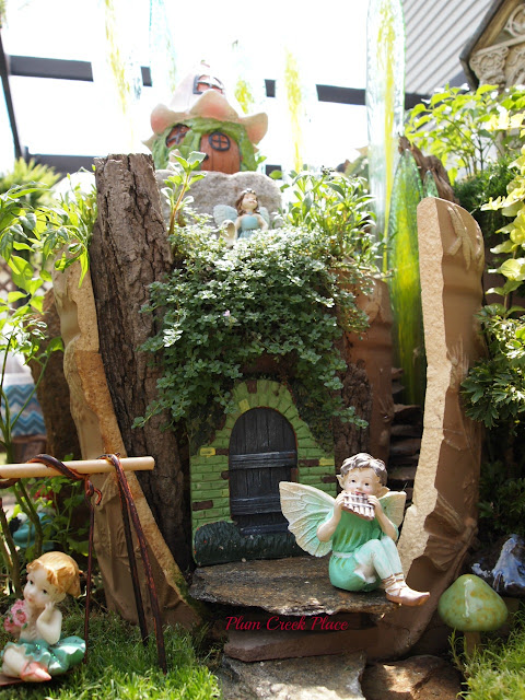 Plum Creek Place, Little Jo's doll party,  broken pot fairy garden, fairy garden, Halloween fairy garden