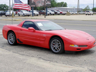 Not brand new but new to us is this 2004 candy apple red'vette 14K miles 