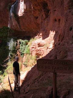 The sign. Trust me, it really is possible to get from behind the falls to here via the 'path' shown.