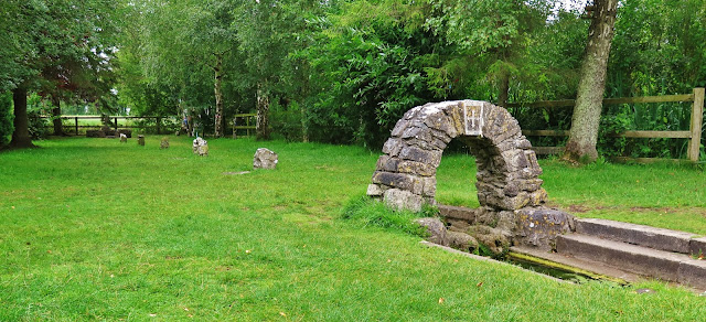 Saint Brigid's holy well, station stones, stone archway and Saint Brigid's Slippers in Kildare, Ireland
