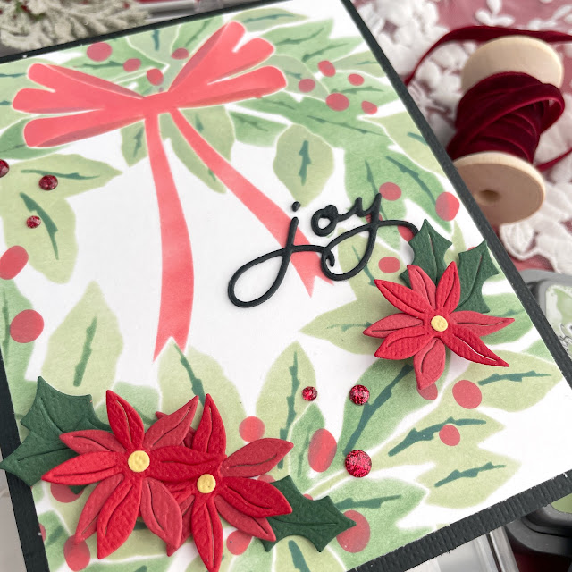 Holiday wreath handmade Christmas card created with Sizzix Stacey Park A Wreath in Time Stencil, Wish Sentiments Thinlits, and Tim Holtz Distress Oxides.