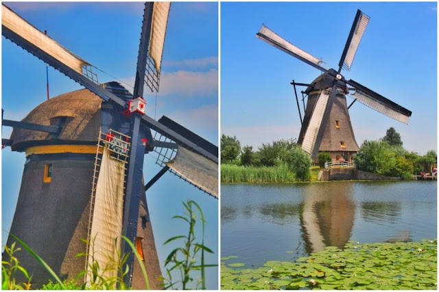 Molino holandes, sus aspas y canal en Kinderdijk en los Paises Bajos