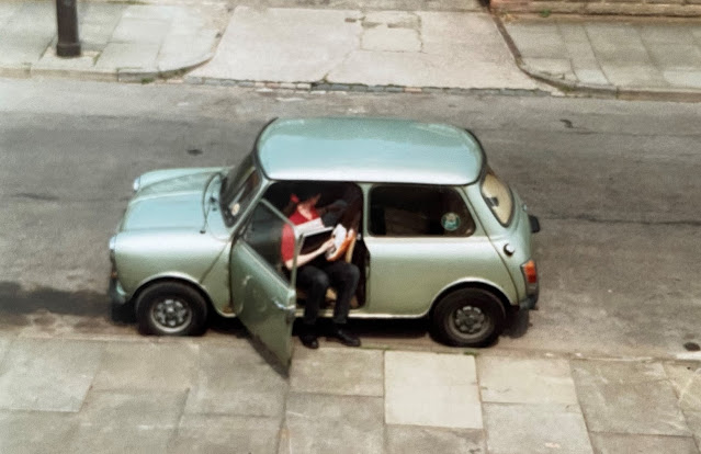 metallic green mini with steph sitting half in it