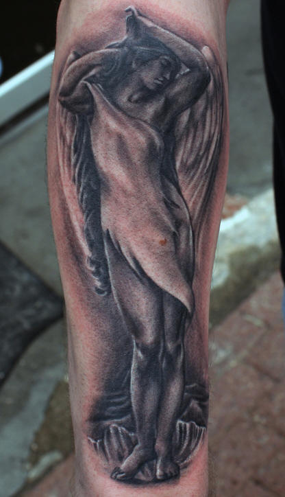 Beautiful black ink angel tattoo